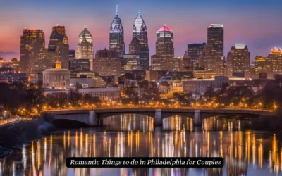 A nighttime view of Philadelphias skyline with brightly lit skyscrapers. The city lights reflect on the river below, and a bridge is visible in the foreground. The sky is a gradient of blue and orange. Text reads, Romantic Things to do in Philadelphia for Couples.